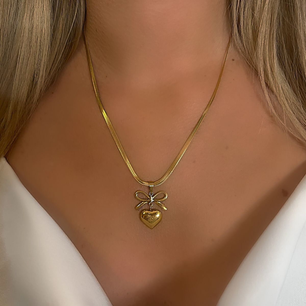 Elite Oasis “Golden Amora Bow” Necklace
