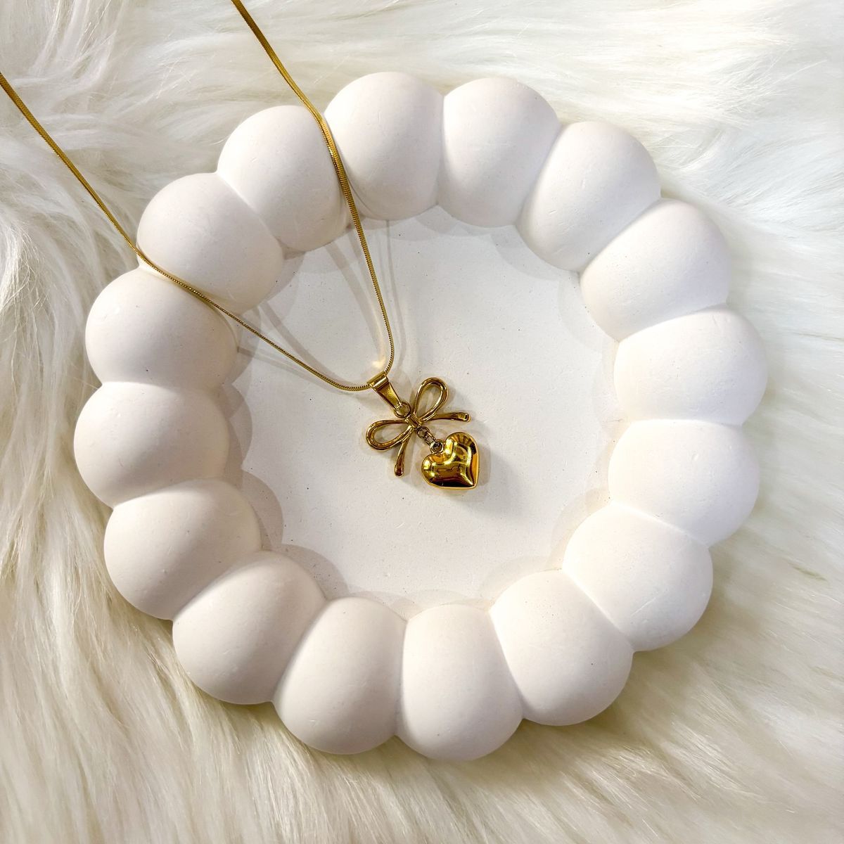 Elite Oasis “Golden Amora Bow” Necklace