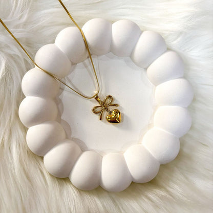 Elite Oasis “Golden Amora Bow” Necklace